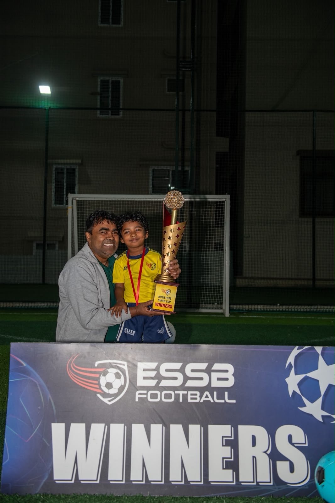 ESSB school team celebrating a tournament win