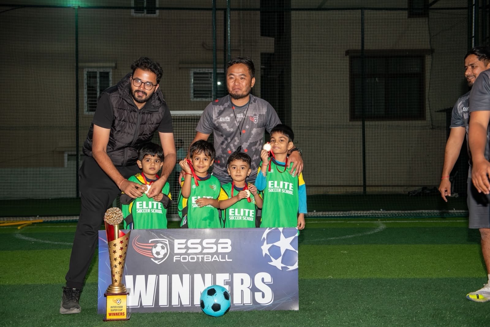 ESSB school team celebrating a tournament win