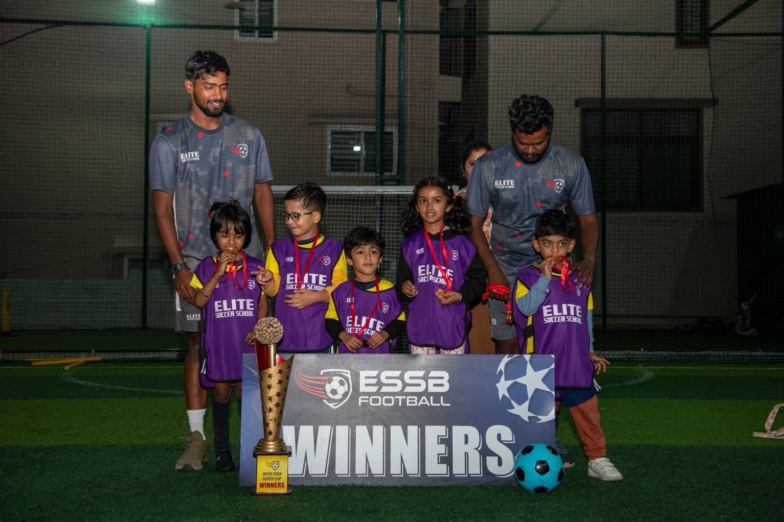 ESSB school team celebrating a tournament win