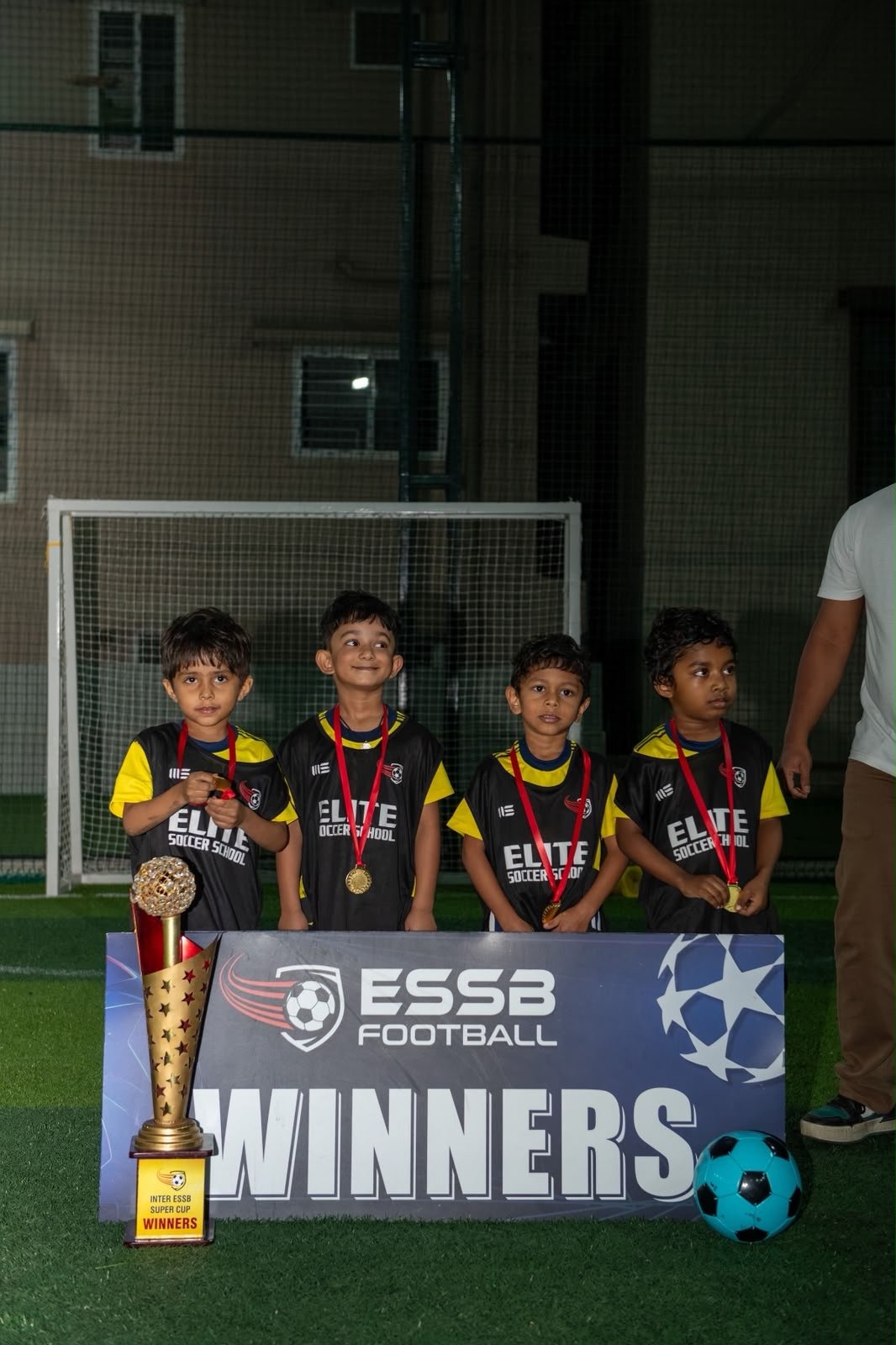 ESSB school team celebrating a tournament win
