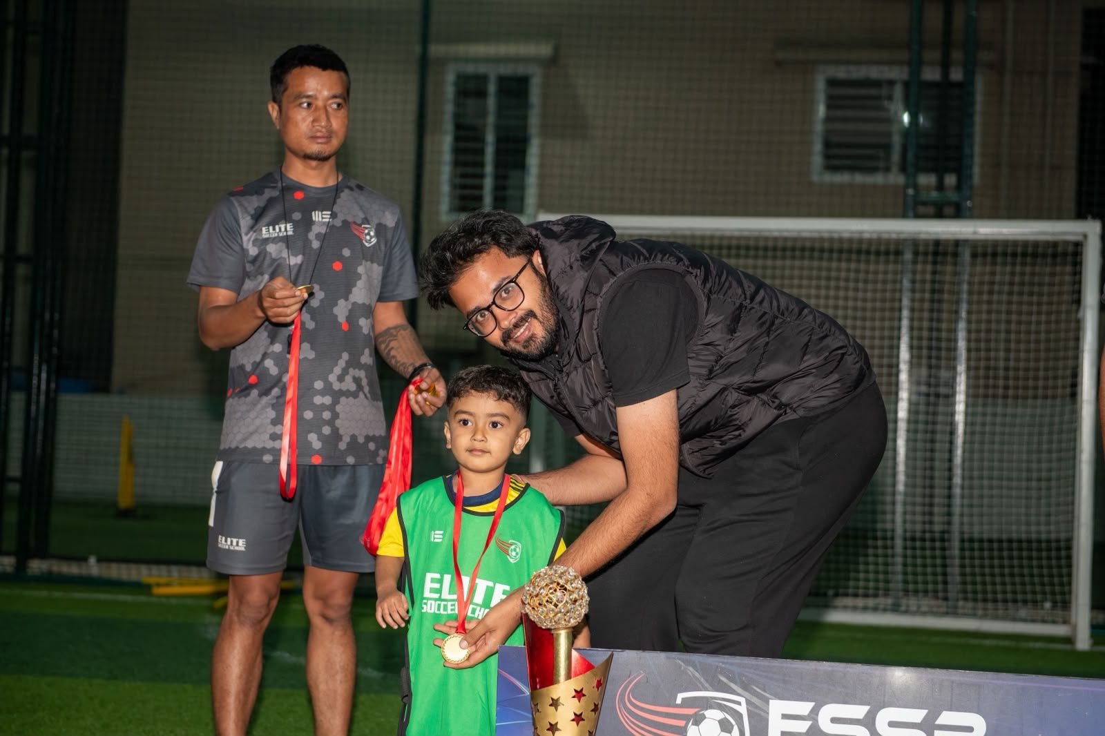 ESSB school team celebrating a tournament win
