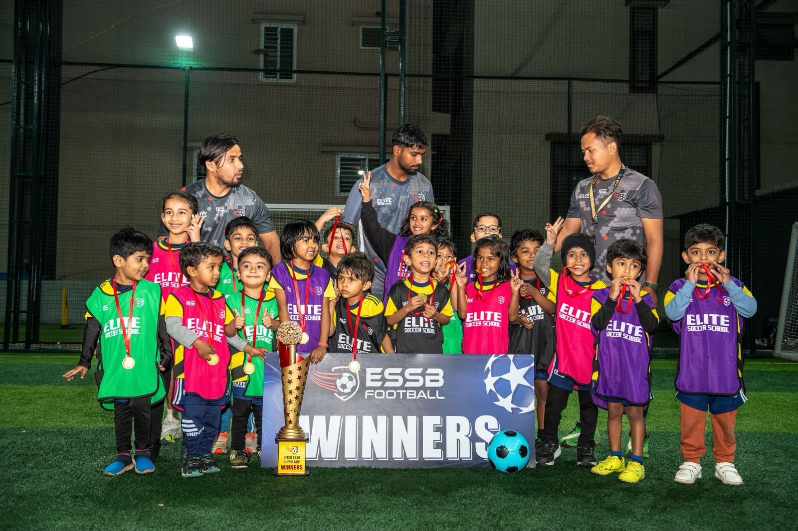 ESSB school team celebrating a tournament win