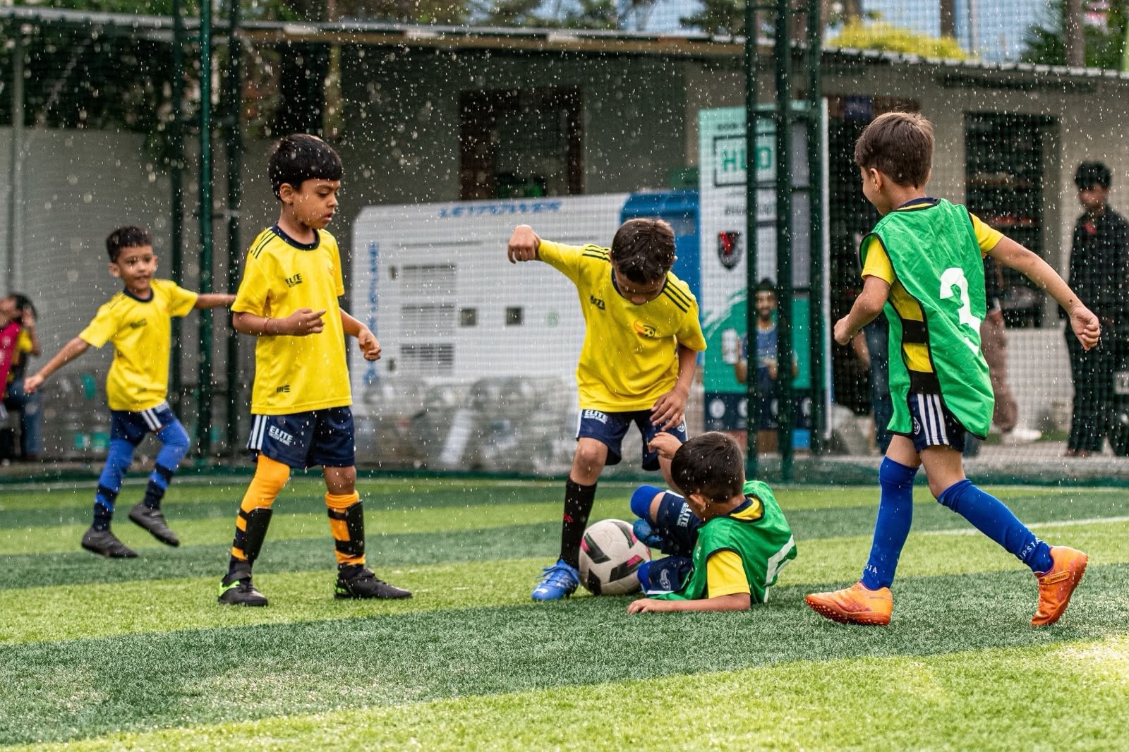 Students training at an ESSB summer football camp
