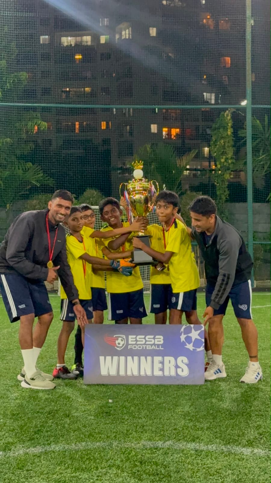 ESSB school team celebrating a tournament win