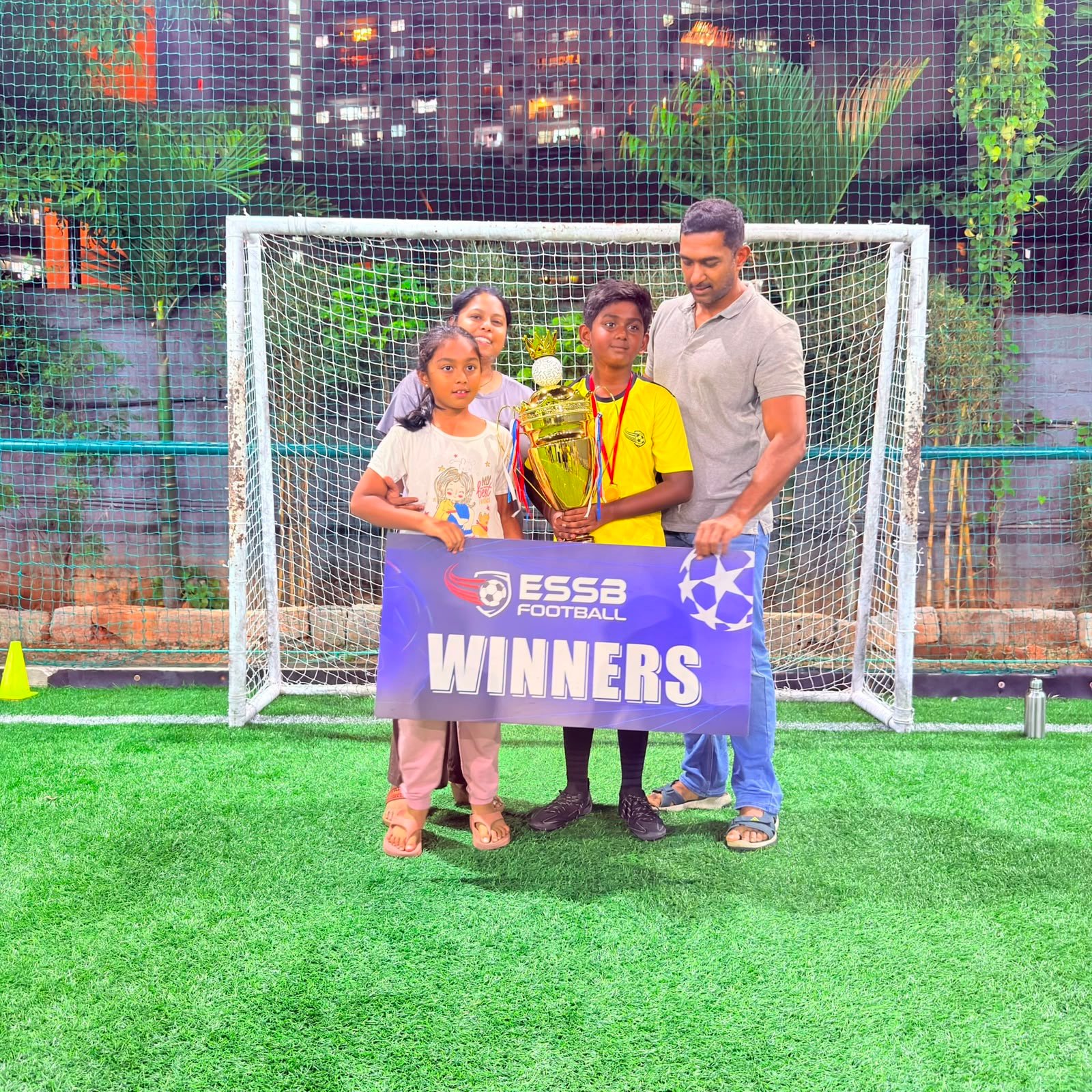 ESSB school team celebrating a tournament win
