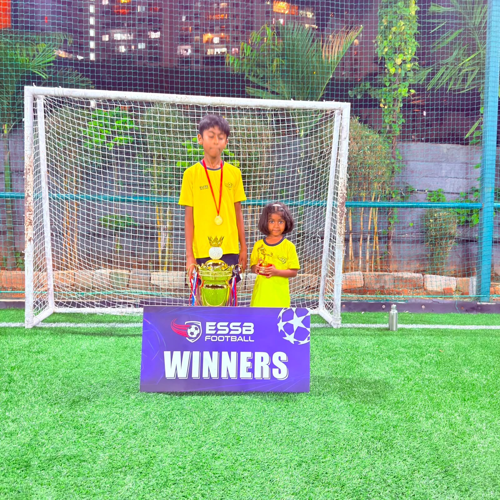 ESSB school team celebrating a tournament win