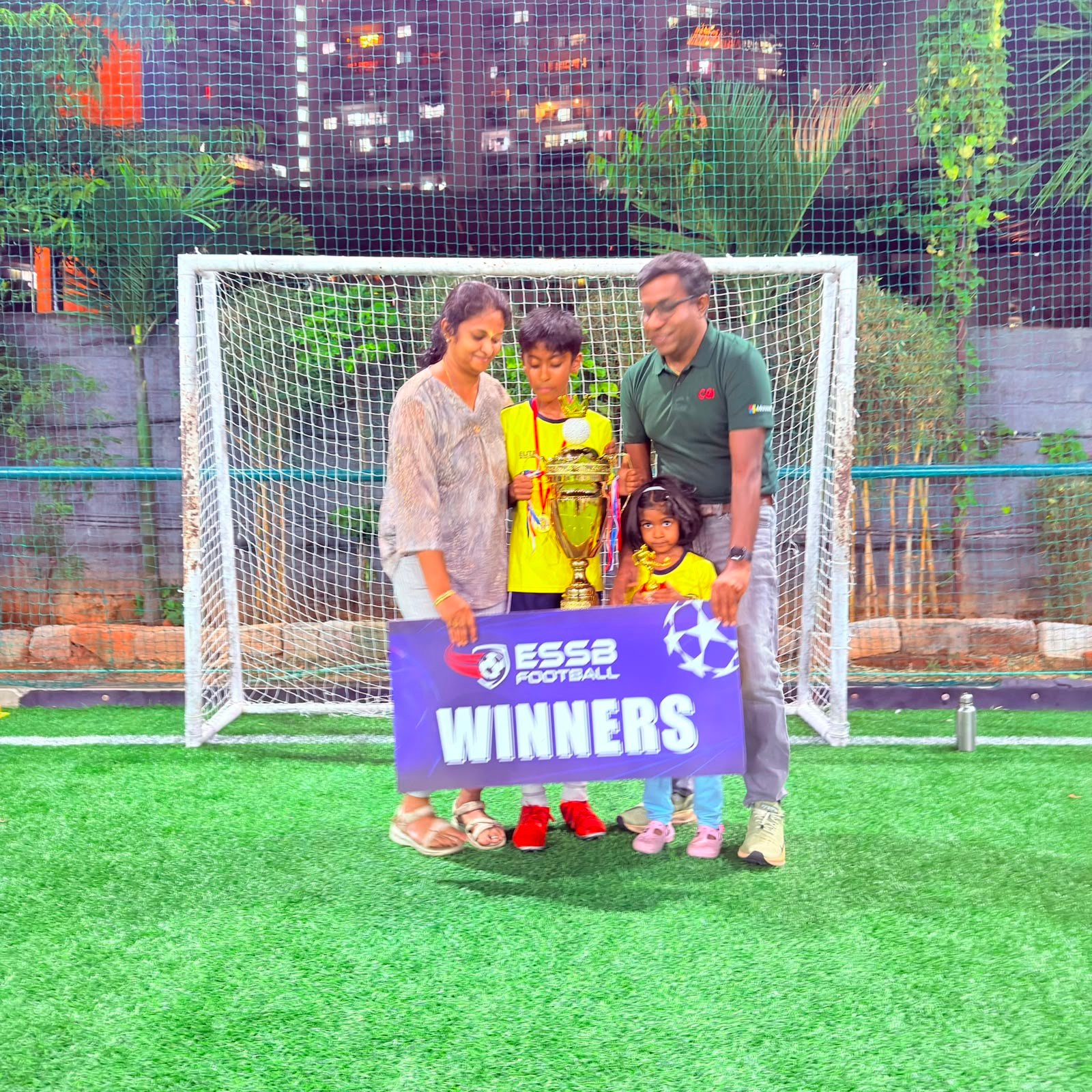 ESSB school team celebrating a tournament win