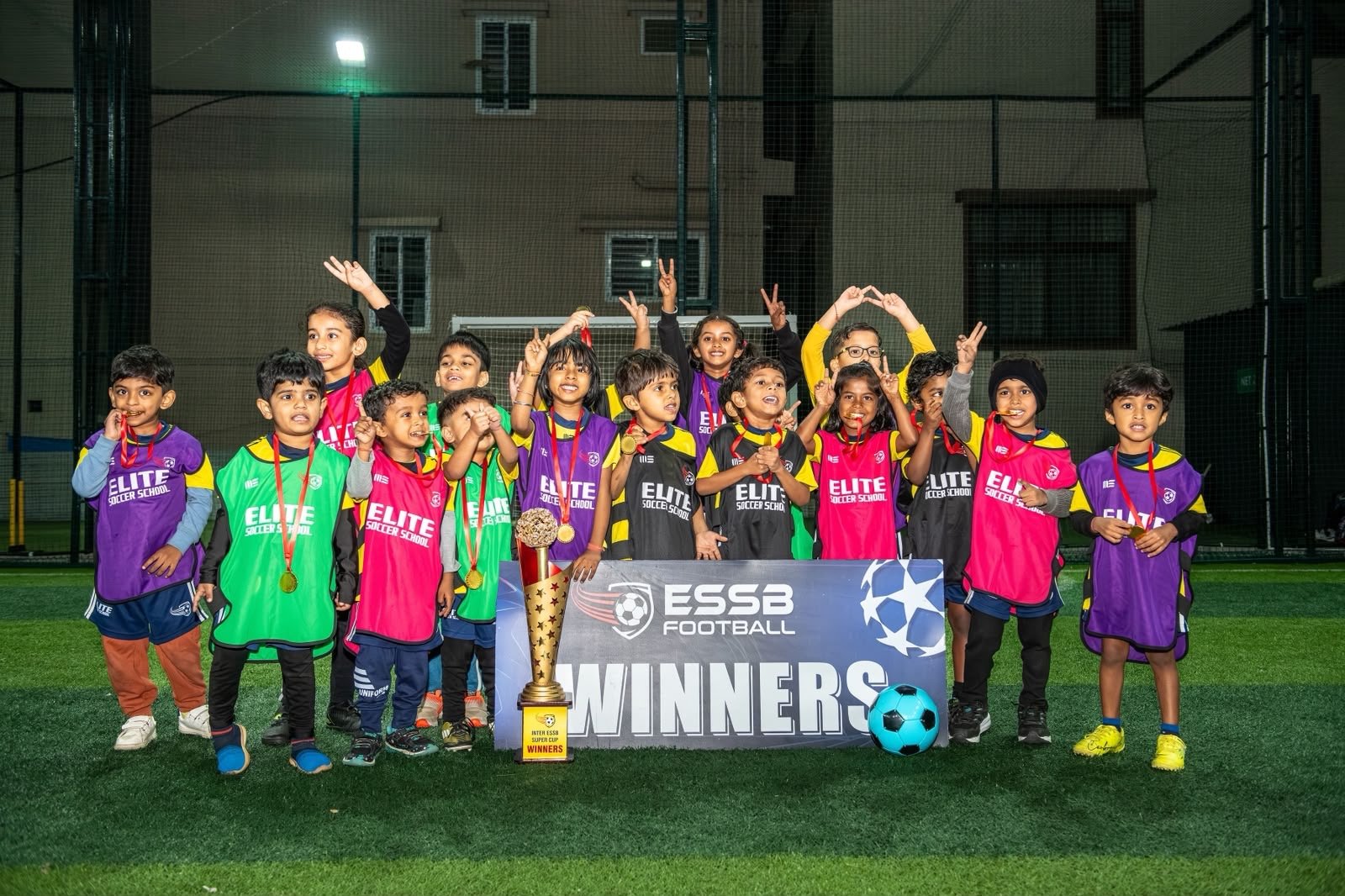 ESSB school team celebrating a tournament win