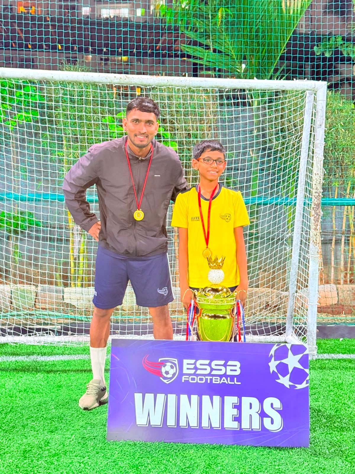 ESSB school team celebrating a tournament win