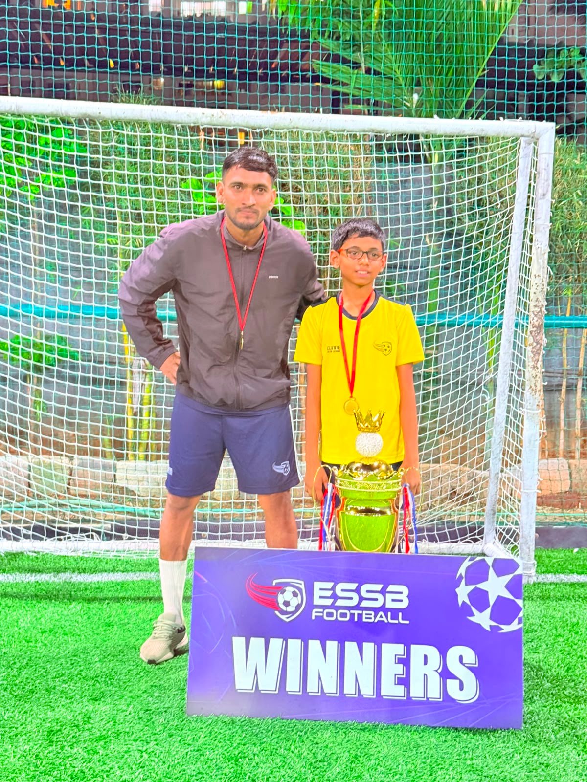 ESSB school team celebrating a tournament win