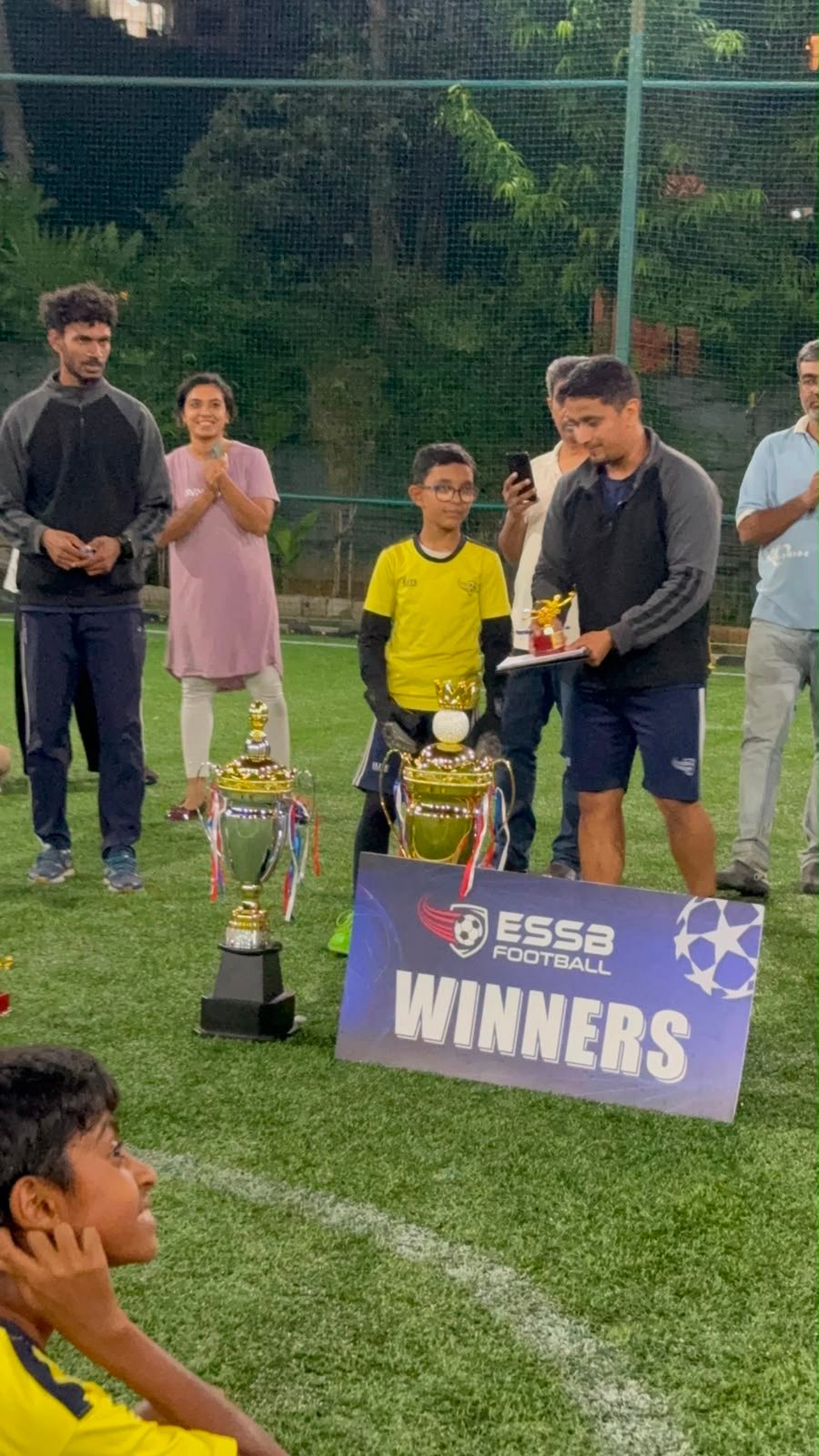 ESSB school team celebrating a tournament win