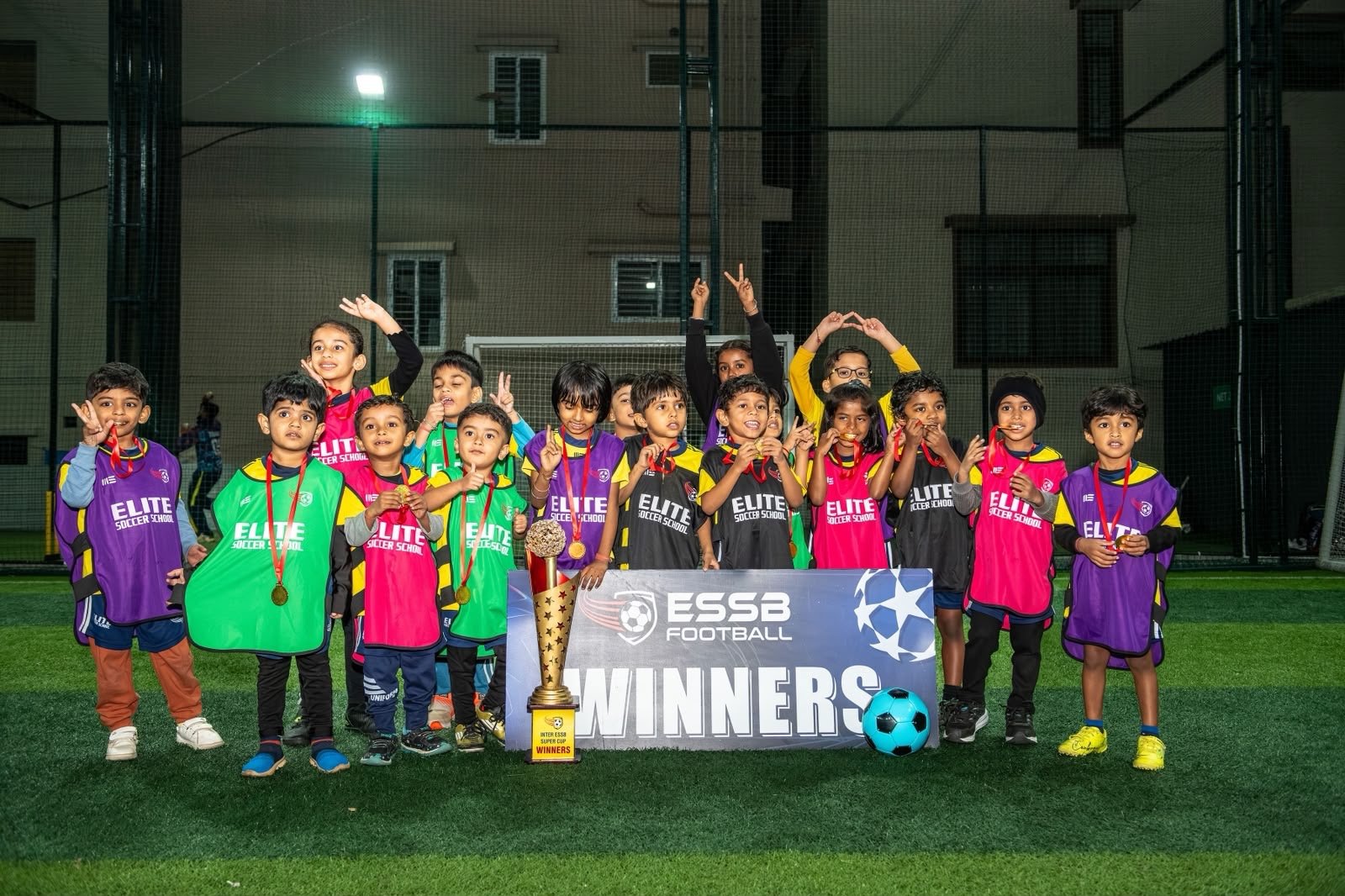 ESSB school team celebrating a tournament win