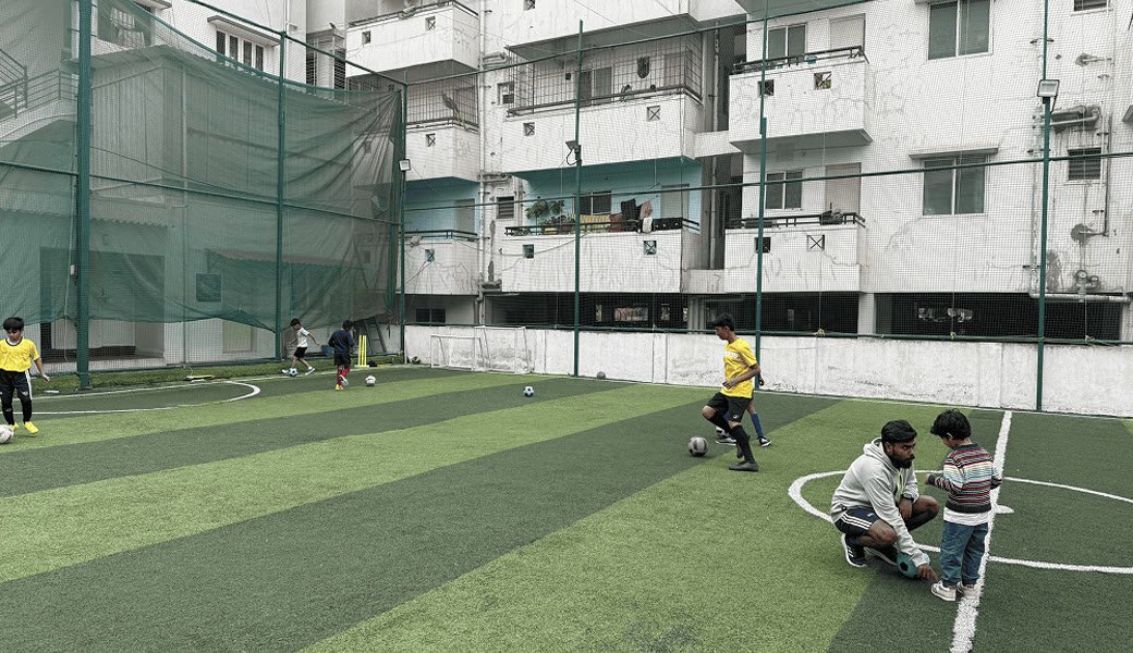 Children training at an ESSB football arena